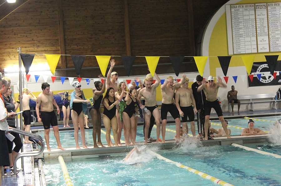 Bison swimmers cheer on their teammates at the CVC championship meet on Jan. 21. Photo by Gabriela Colovan Costa