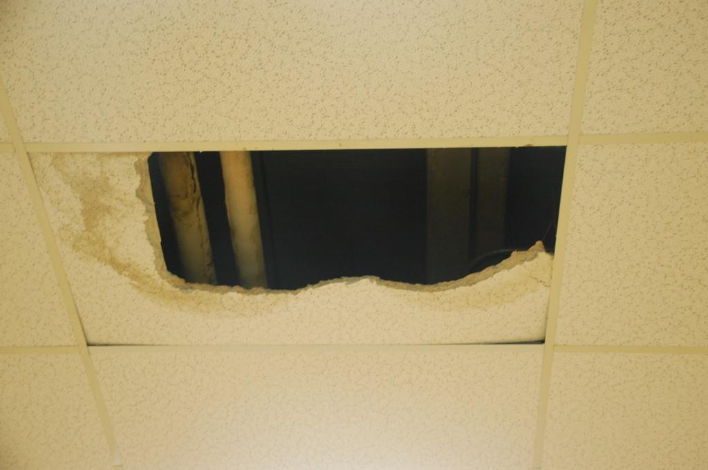 This photo by Sam Lowenkamp shows one of the many holes in the band room.