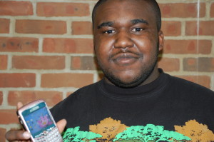 Senior Jerry Gordon shows off his PDA.