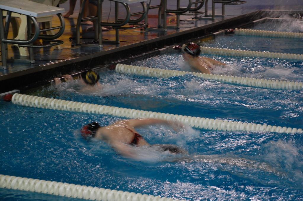 A+Beachwood+swimmer+finishes+a+lap+of+butterfly%2C+coming+in+first+place.++Photo+by+Scott+Janovitz.