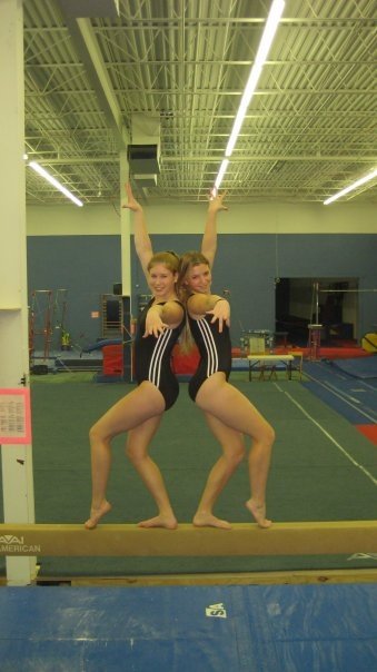 Arielle Ginsburg and Gabrielle Mitchell pose on the balance beam.  Photo courtesy of BHS gymnastics team.
