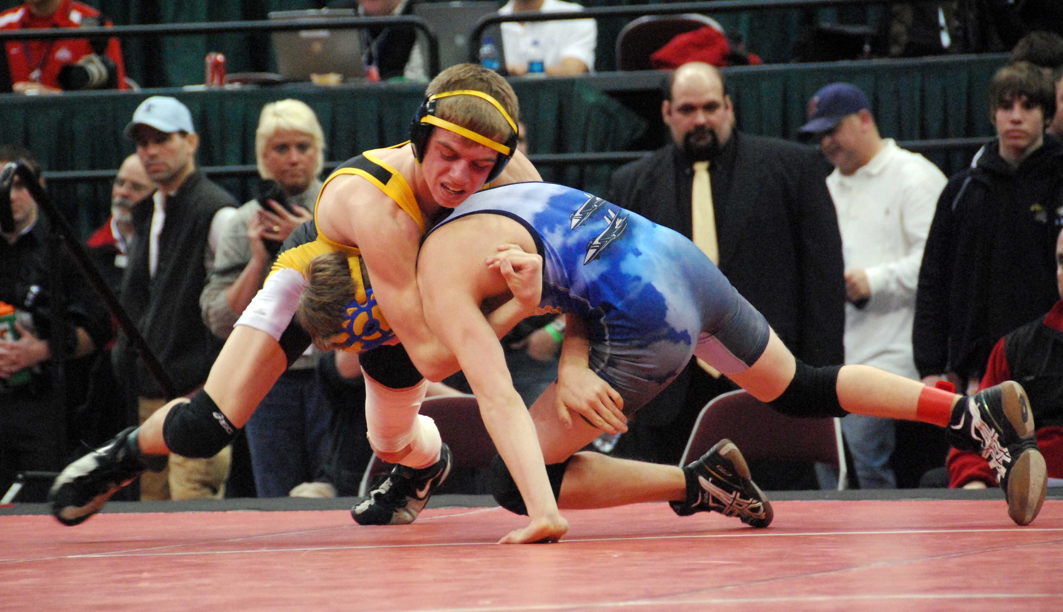 Alex Dronzek takes control of his opponent in the finals match. Photo by Marc Eisenberg.