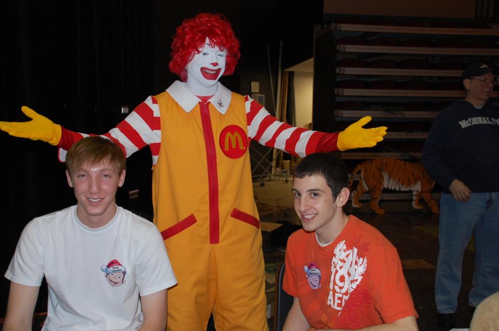 Josh Schwartz and Danny Noureddine pose with Ronald McDonald.
