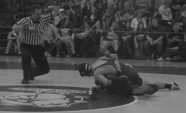 Ryan+Harris+Pins+an+Opponent+at+the+District+Tournament+at+Garfield+Heights.