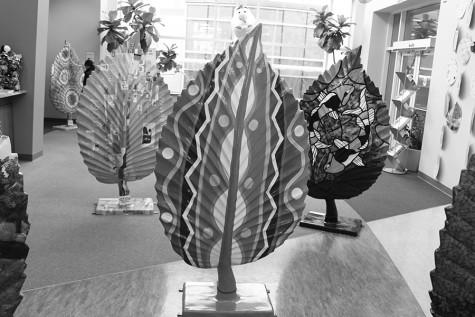Greg Perry's junior achievement marketing class sold commemorative beech leaves to local businesses. Some of the leaves are on display at the Beachwood Community Center. Photo by Bradford Douglas.