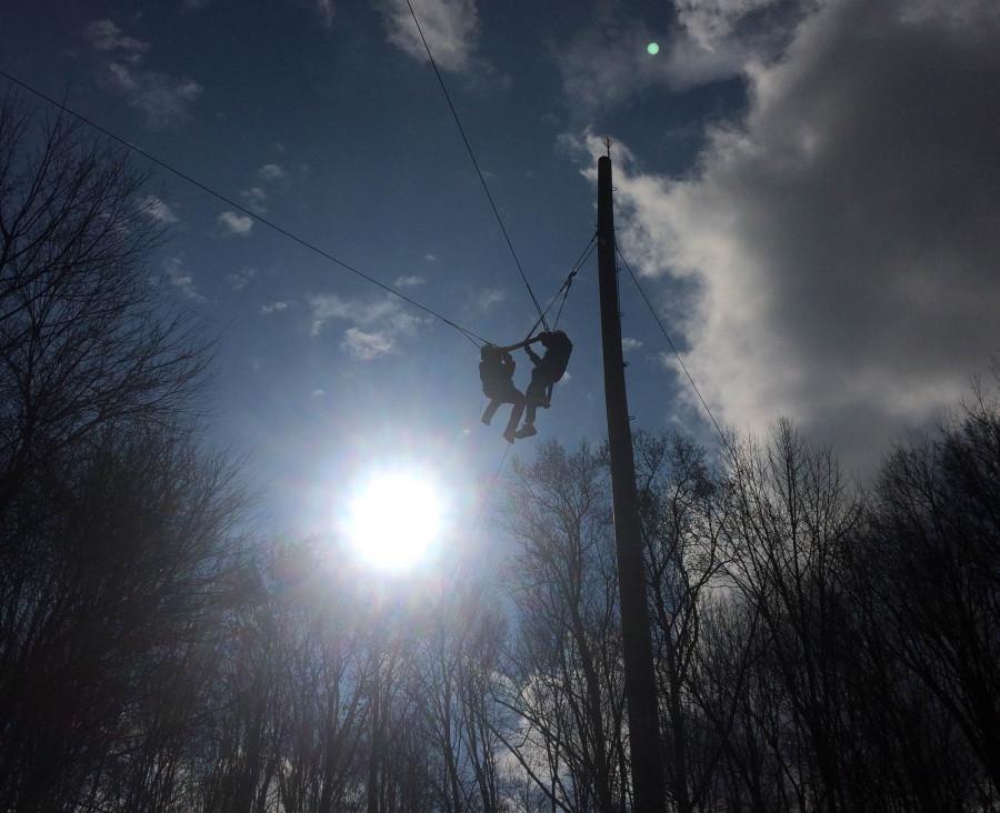 Two students enjoying the giant swing at Camp Asbury in Hiram. Photo by Sydney Eisenberg.