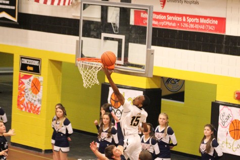 Maishe Dailey scores at a home game. Photo by Bradford Douglas.