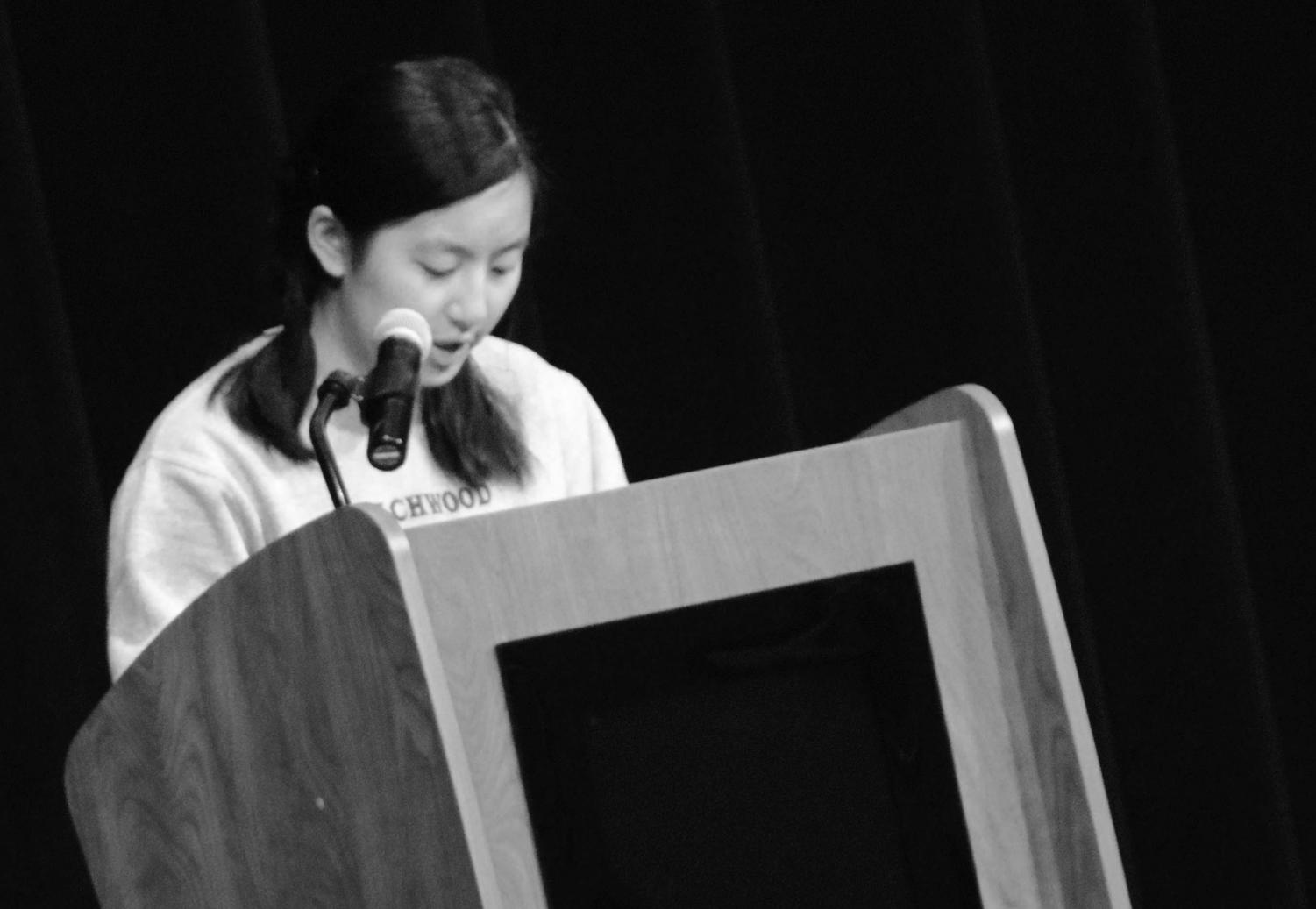 Student Council Exec Board President-Elect Jing-Jing Shen addressed the student body at the presentation of candidates on Friday, Feb. 23. Photo by Jemiah Richardson