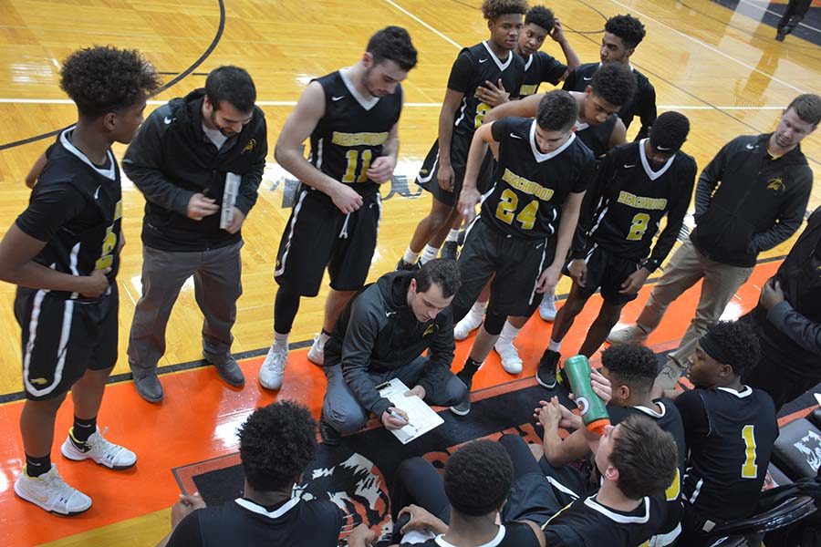 Coach Jon Mannarino calls a play against Chagrin. Photo by Sam Thomas.