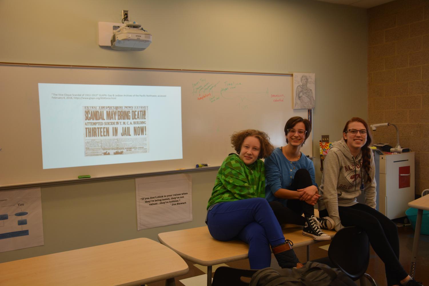 Sophomore Channah Creve, freshman Emily Isaacson and sophomore Mirabelle Wooley at the first presentation on Feb. 7. Photo by Jacob Borison