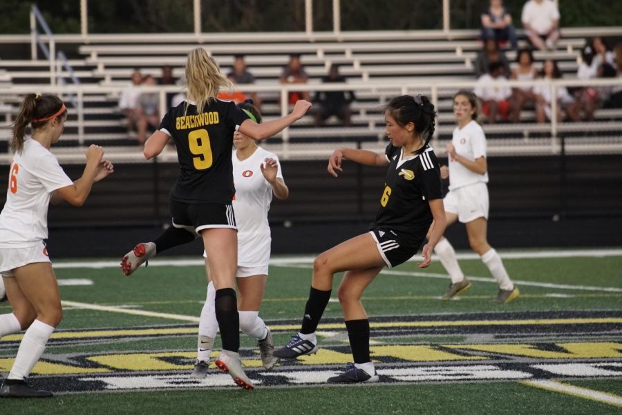 Sunny Wang fights for control of the ball in last years Orange game. 