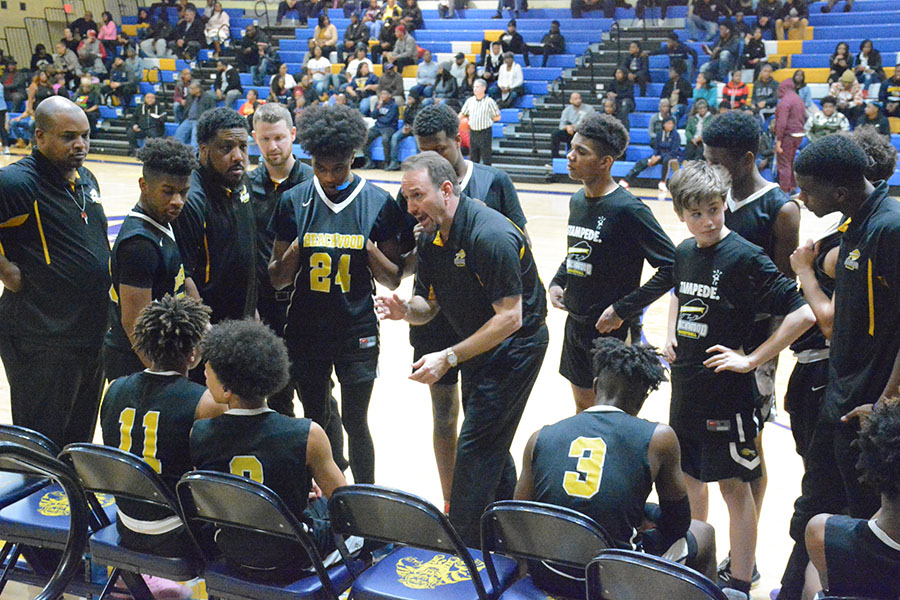 Coach David Krasnow addressed the team during last years second-round playoff game against Warrensville. 