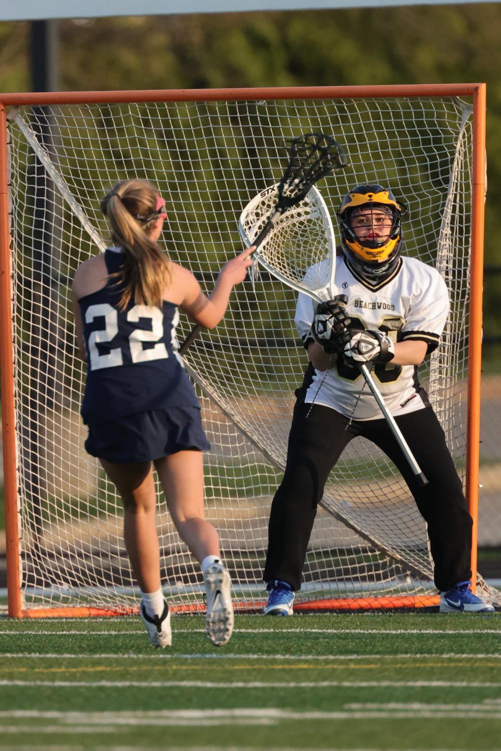 Junior Leah Yakubov defends the goal against a Solon attacker. 