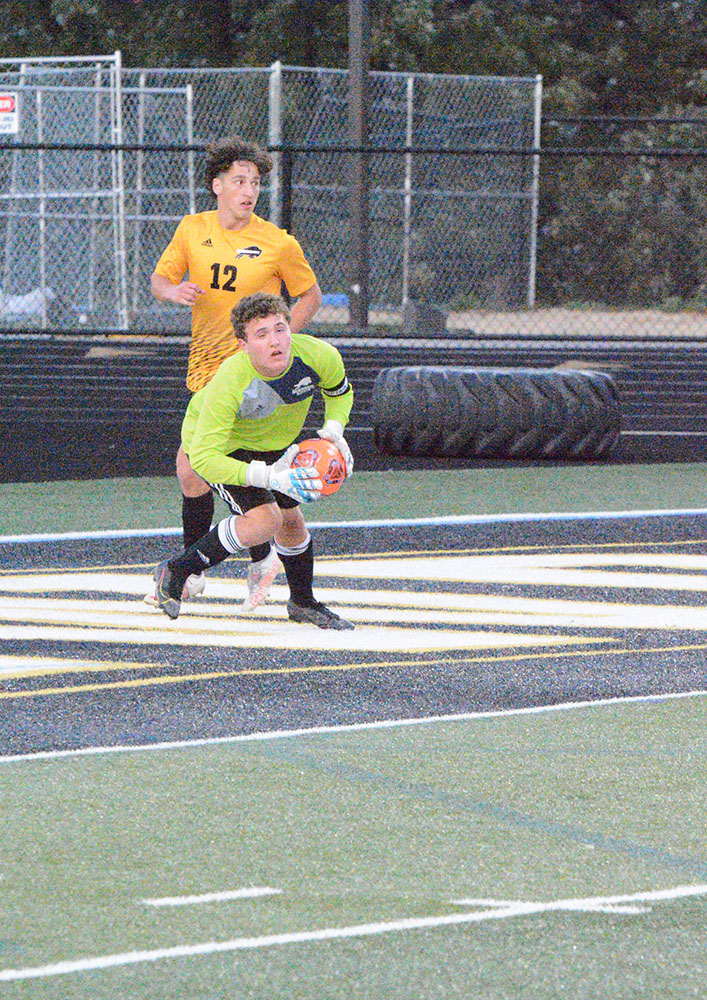Goalie Jake Muencz leaps for a save.