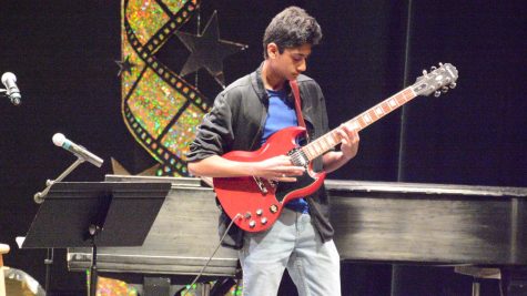 Mukherjee transitions from John Lennon to Black Sabbath. 