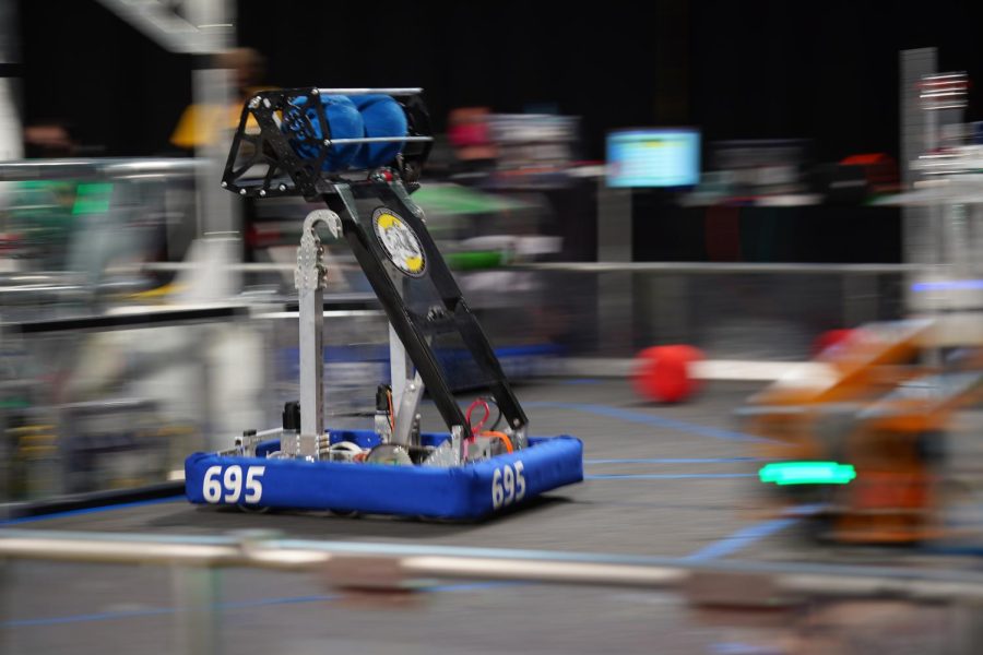 Robot 'Nikhil' approaches the hub to deposit its cargo at the greater Pittsburgh regional tournament in March. 