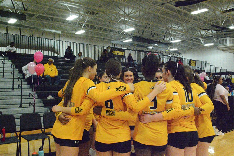 The+Bison+volleyball+team+honored+seniors+and+presented+a+check+for+Volley+for+the+Cure+on+Thursday%2C+Oct.+13+at+a+home+game+against+Orange.+
