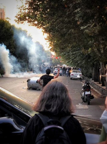 Protesters clash with Iranian security forces on Sept. 20, 2022 in Tehran.  