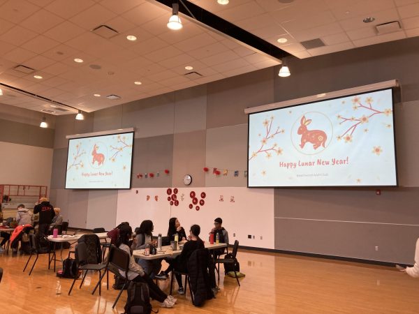 Students enjoyed food and watched a presentation during the Lunar New Year event in January, 2023. Photo courtesy of Allen Yu