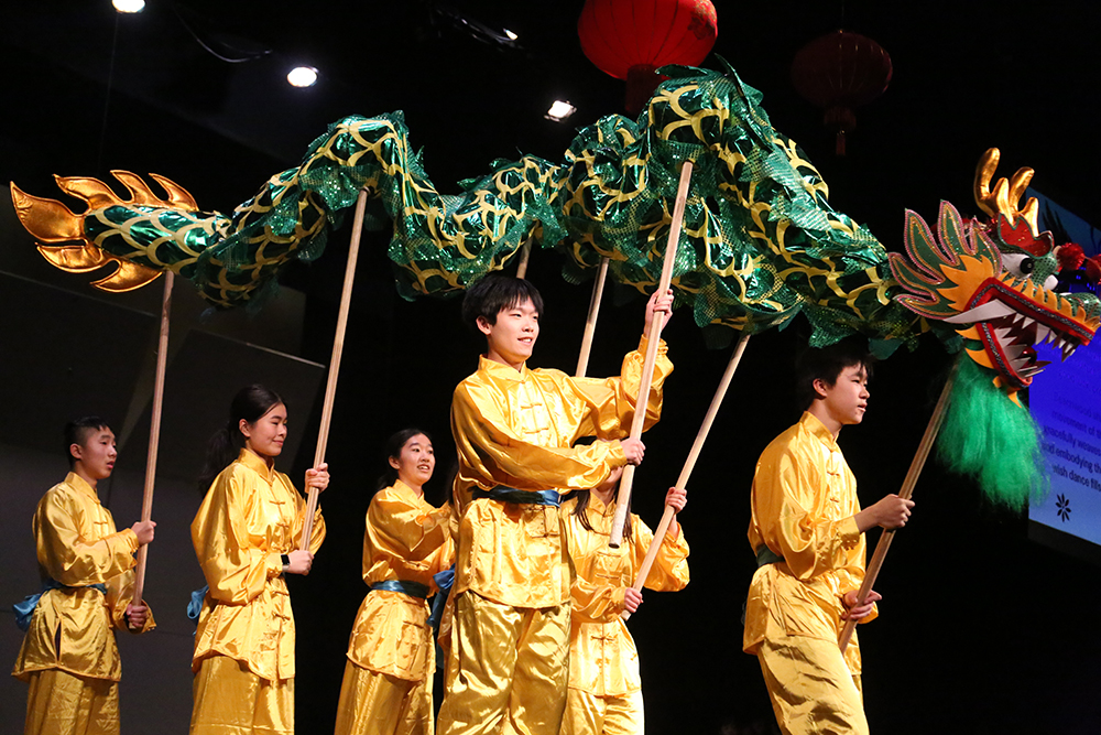High school students danced to welcome the year of the dragon. 