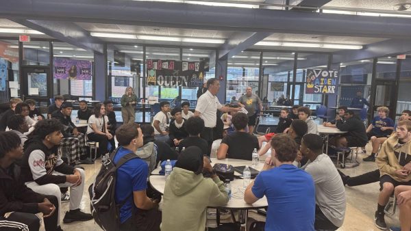 Tom Burton from WeEmpower, LLC led the summit with the Beachwood and Brooklyn football teams. 