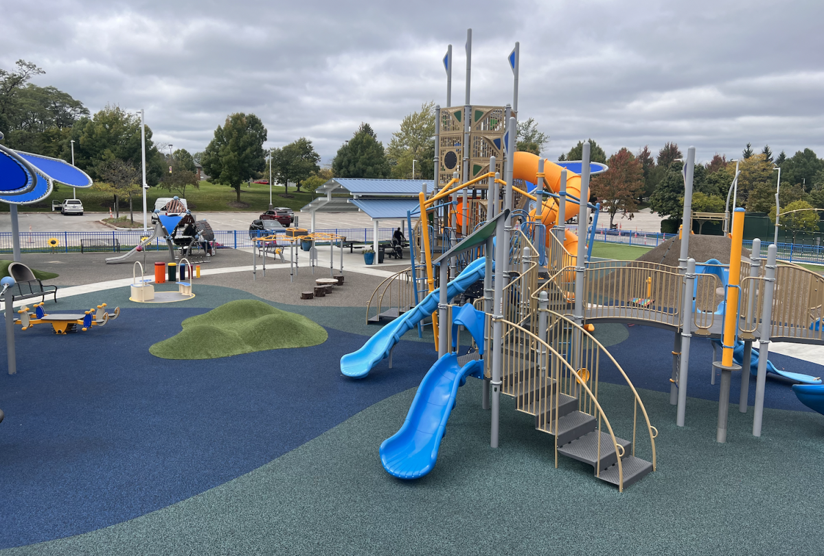 The playground is viewed as a community hub where both children and parents connect.