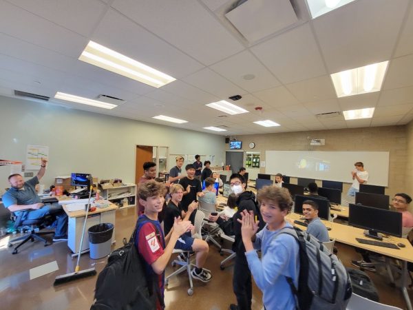 Engineering club members cheer at the club's introductory meeting on Sept. 19.