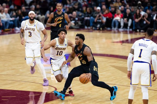 Donovan Mitchell dribbles the ball during a game against the Lakers last season. 