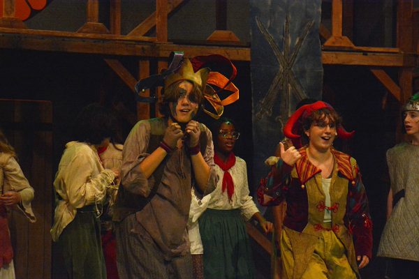 Ward as Quasimodo is crowned as ugliest in town during the Feast of Fools.