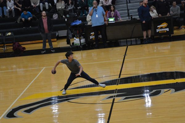 Junior Derek Fan gets up to send a rocket at the opposing team. 