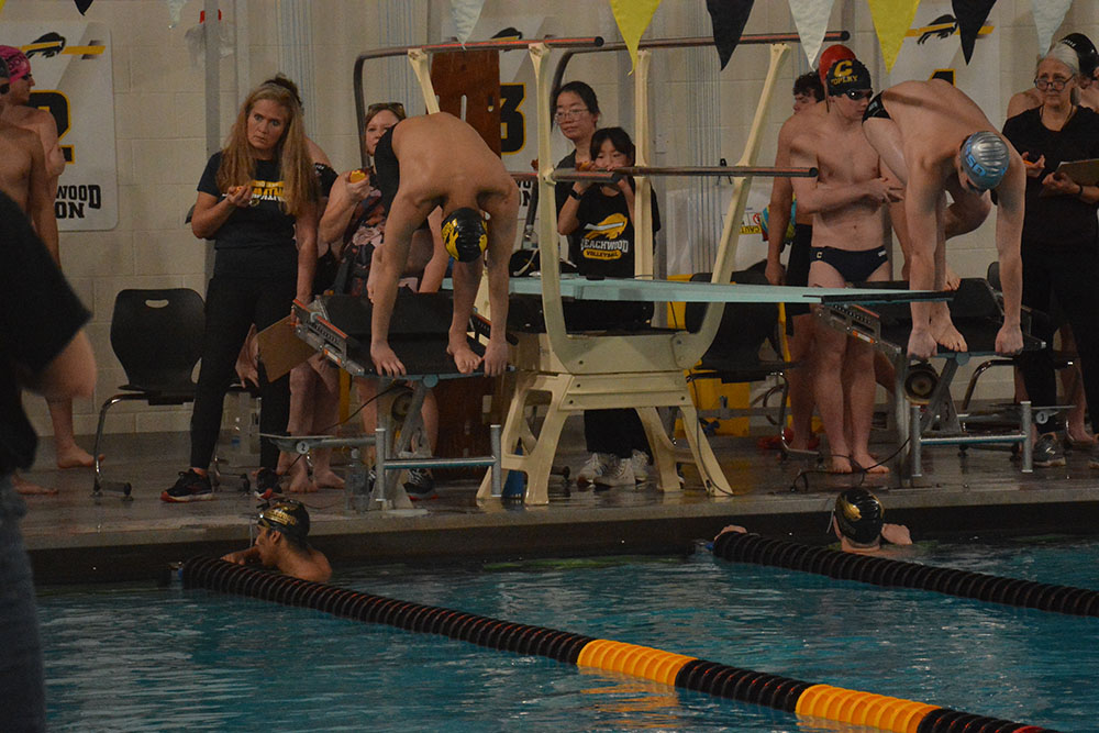 Adam Hong preparing to dive off of the block