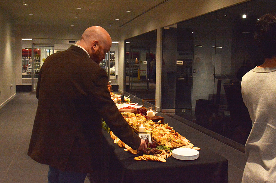 Attendees enjoy the plentiful food options at Night at the Races.
