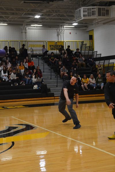 Principal Paul Chase launches a rocket. 
