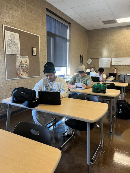 Students in Dr. Casey Matthews' class can now wear brimless hats without fear of consequence.