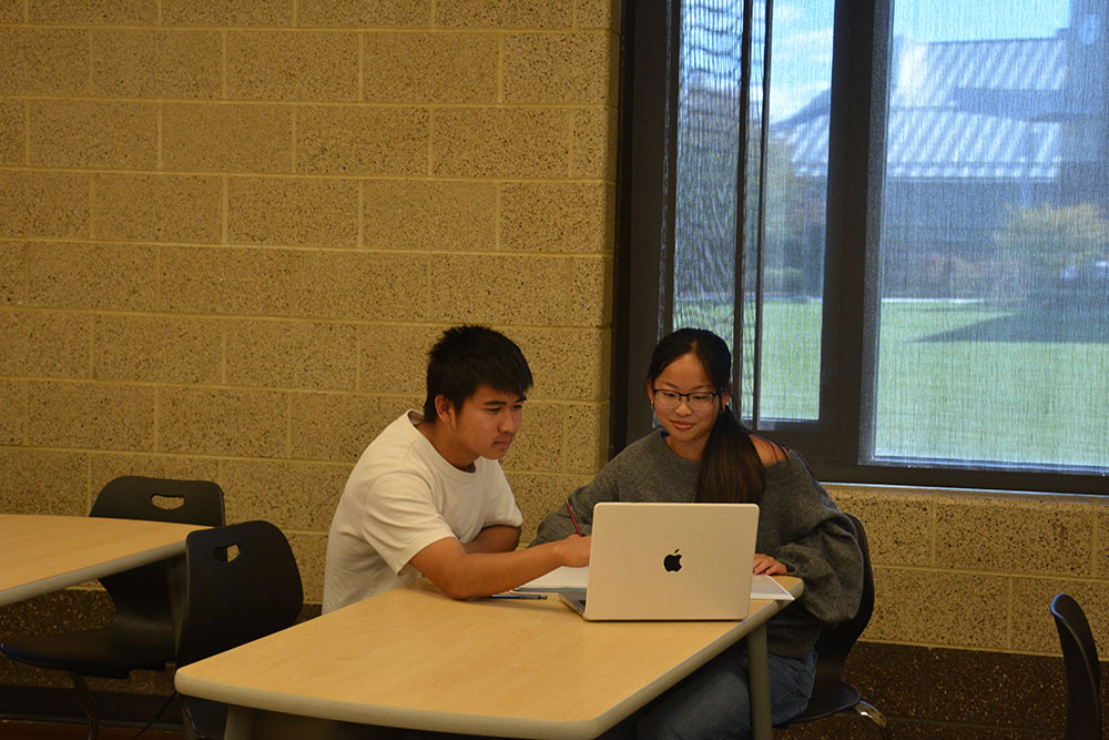 “My parents have always said that education is important. My parents are Chinese immigrants, I'm Chinese American, [and that's a] value that has always been ingrained in our community,” said Senior Lyndia Zheng, pictured with Tony Zheng