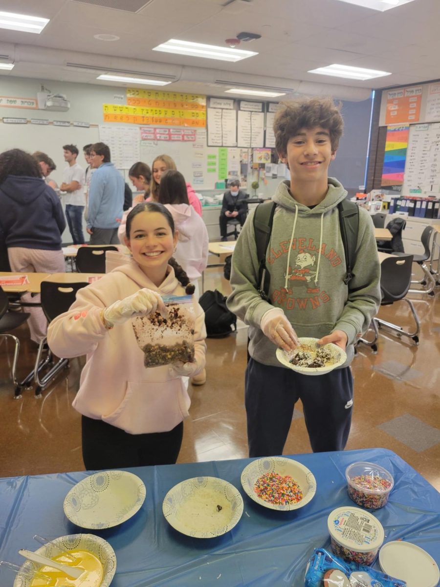 Israeli culture club members make kadorei shokolad, traditional Israeli chocolate balls