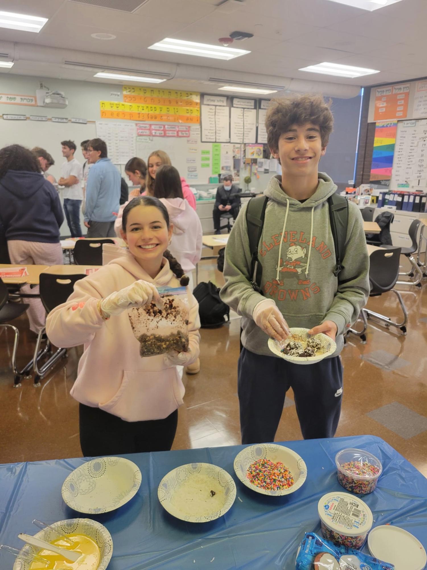 Israeli culture club members make kadorei shokolad, traditional Israeli chocolate balls