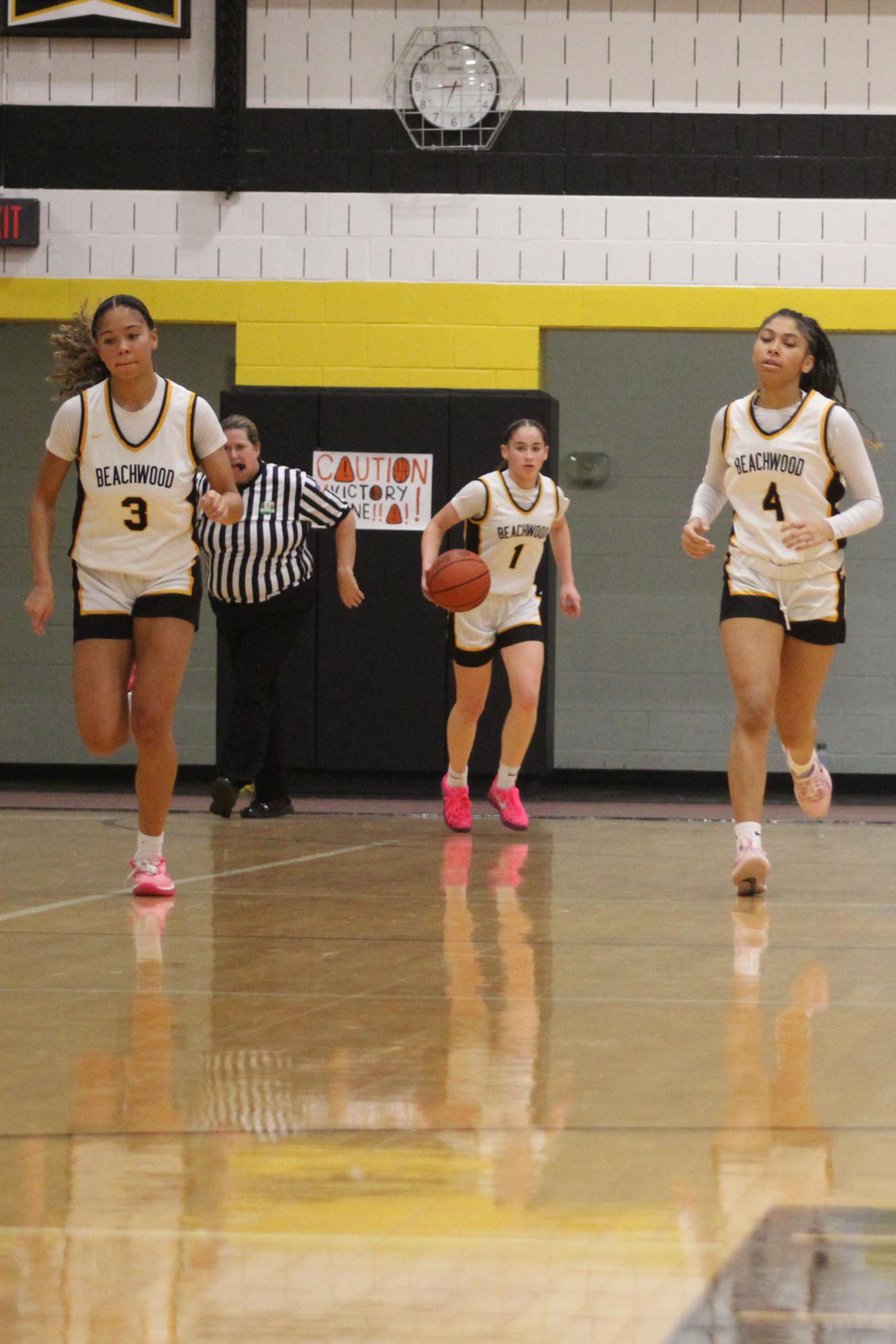 Sophomore Zoe Walters (center) was the leading scorer for the Bison, notching 29 points against Barberton.