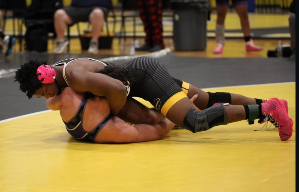 Caleb Greenwood bests an opponent at the Bison Duals. 