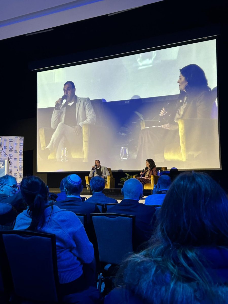 Lynnne Cohen, incoming campaign chair for the Cleveland Jewish Federation, interviews Eli Sharabi during the Federation's closing campaign event.