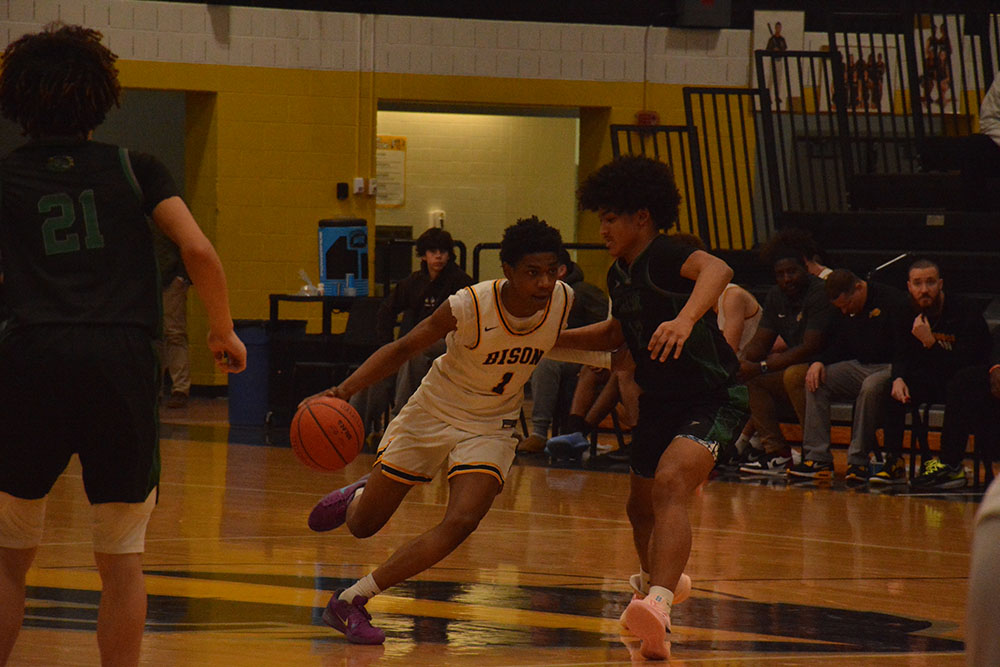 Senior CJ Payton powers past a Lakeside defender. 
