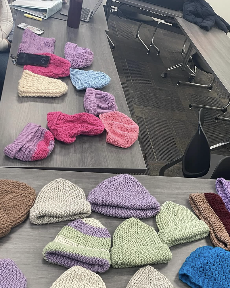 Club members made 27 hats this winter and donated them in early March to Frontline Services, an agency serving the homeless. 
