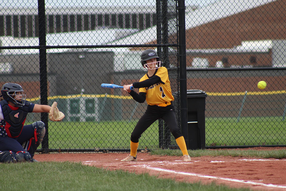 Allie Rindsberg has her eyes on the ball, and swings the bat for a hit.