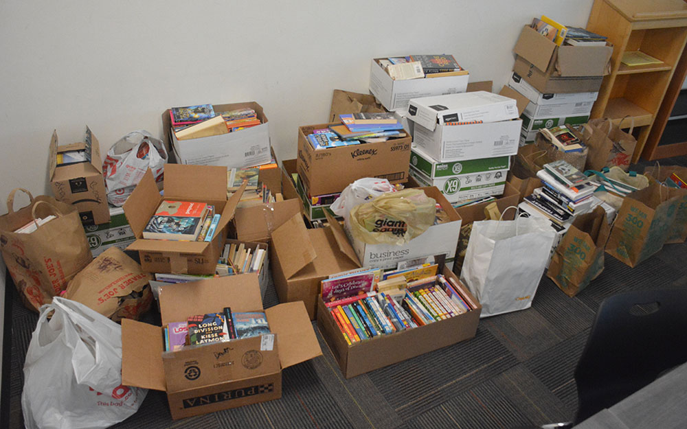 Over 1,600 books are boxed in the library classroom, waiting to be delivered to the Cleveland Kids' Book Bank.
