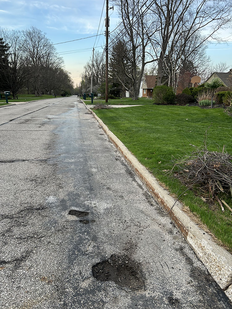 North Woodland is one of many Beachwood roads damaged by extreme weather this winter. 
