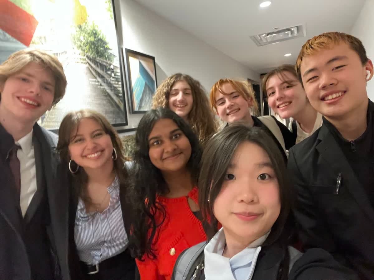 From left: juniors Alex Feuer, Stella Roller and Ritika Iyer; sophomore Antoni Hinczewski, seniors Ida Chang and Sasha Kheyfets; junior Charlie Soroka and freshman Kevin Fu  just before the first committee session at The Ohio State Model United Nations Conference, Feb. 27.

