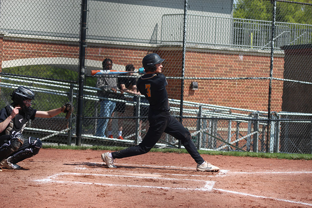 Gavi Lappen swings through the pitch and the catcher makes the grab. 
